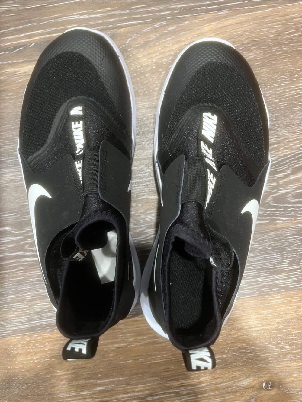 Nike Kids Black and White Slip-On Sneakers